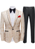 Beige tuxedo jacket with black lapels, white shirt, black bow tie, and red pocket square, paired with black pants on a white background.
