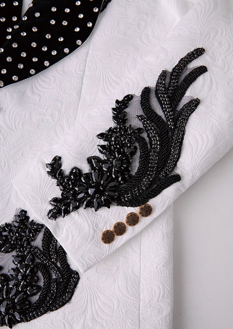 White jacquard sleeve with black beaded wing embroidery cuff detail