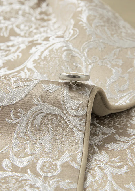 Single button closure detail on champagne gold shimmering jacquard tuxedo - Nevo Suits