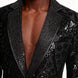 Close up of black micro-beaded detail on notched lapel of velvet jacket
