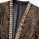 Close up of the regal band collar with gold crystal grid detailing