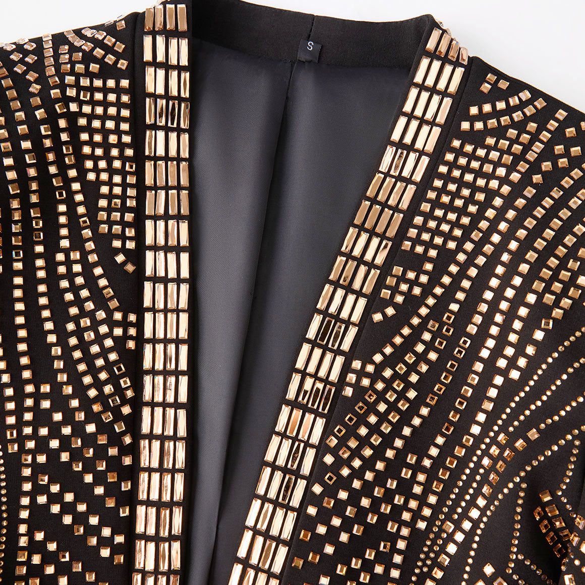 Close up of the regal band collar with gold crystal grid detailing