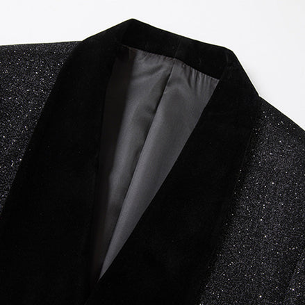 Close up of oversized black velvet shawl collar on shimmering stardust jacket 