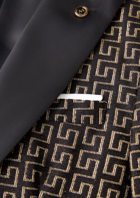 Model wearing Obsidian Eclipse black and gold greek-key jacquard tuxedo with satin peak lapels - Nevo Suits