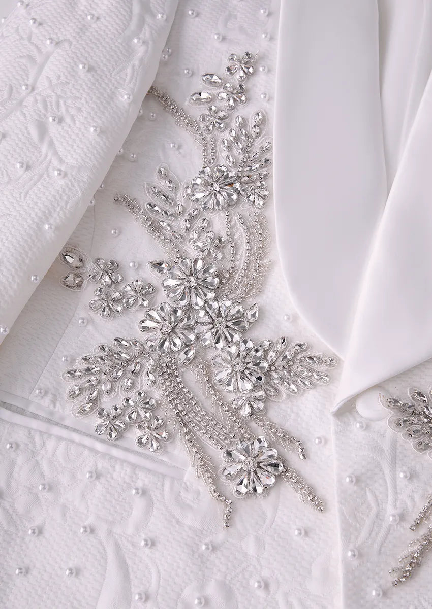 Detail of heavy silver crystal appliqué on white tuxedo jacket - Pearl Symphony - Nevo Suit™