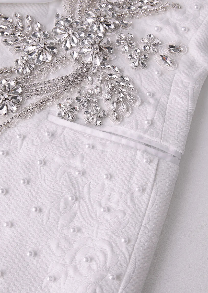 Detail of heavy silver crystal appliqué on white tuxedo jacket - Pearl Symphony - Nevo Suit™