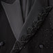 Close up of black sequin leaf vine embroidery and scattered crystals detail - Nevo Suits