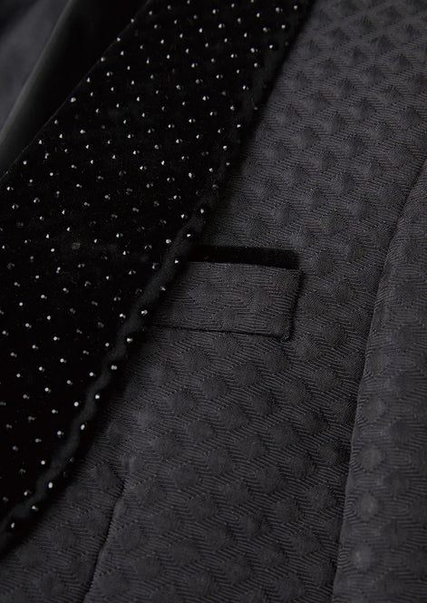Close up of black micro-diamond jacquard fabric texture