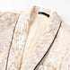 Close up of black piped shawl lapel on gold metallic tuxedo jacket |