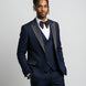 Man wearing Cobalt Starlight navy blue and gold crystal peak lapel tuxedo - Nevo Suits
