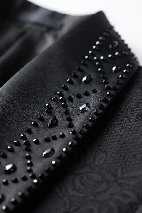 Back view of Onyx Prism black jacquard 2-piece tuxedo - Nevo Suits