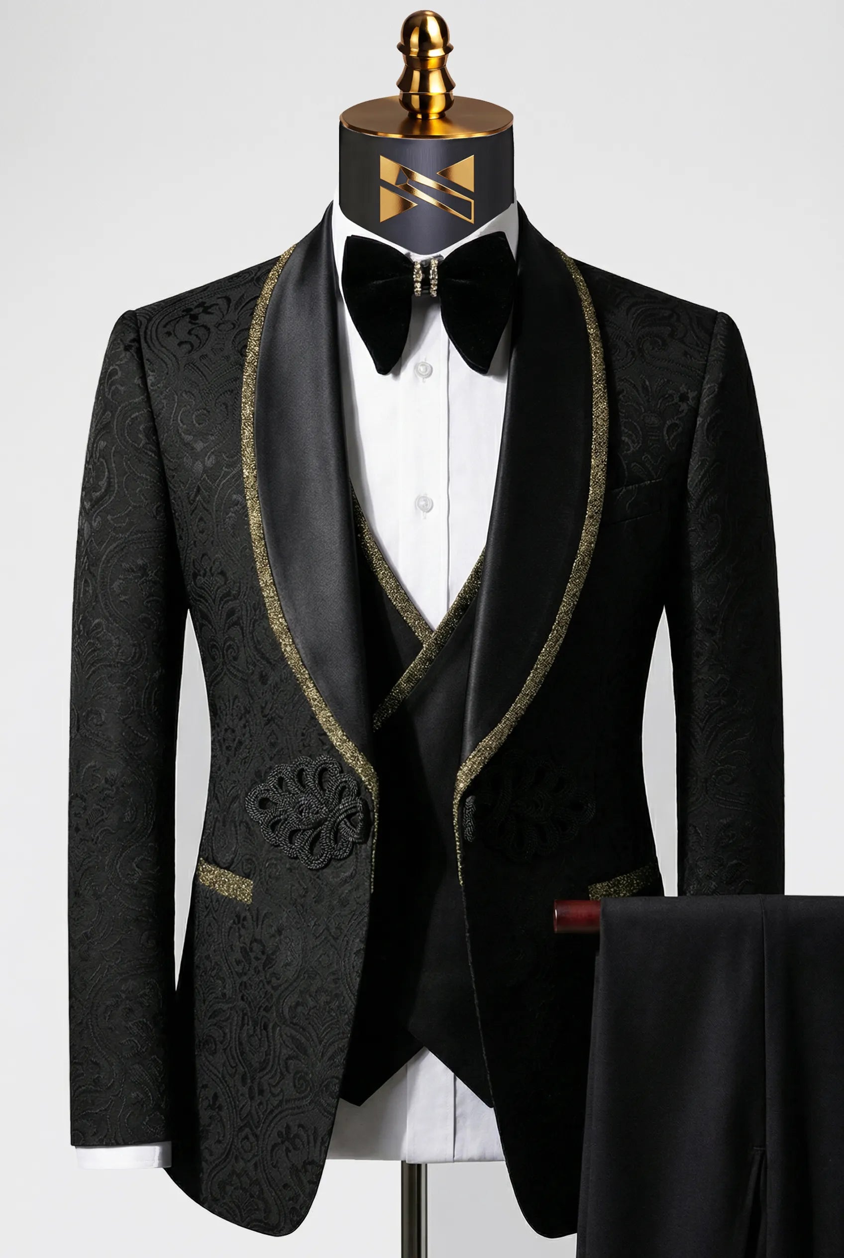 Close up of black satin shawl collar with metallic gold trim on Nevo tuxedo jacket