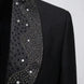 Macro photography of black suit fabric and shimmering rhinestone clusters