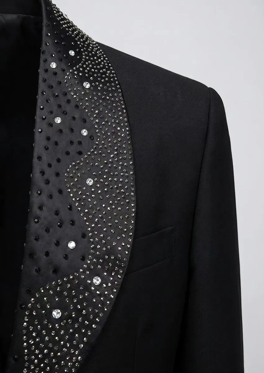 Macro photography of black suit fabric and shimmering rhinestone clusters