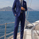 Ink Crownline royal blue double-breasted suit worn on a yacht
