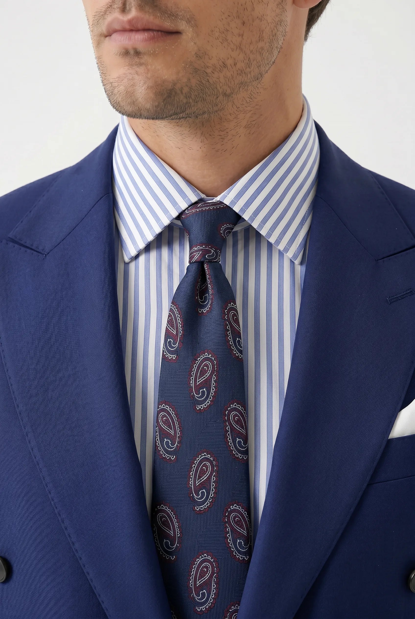 Ink Crownline royal blue peak lapel and tie styling detail