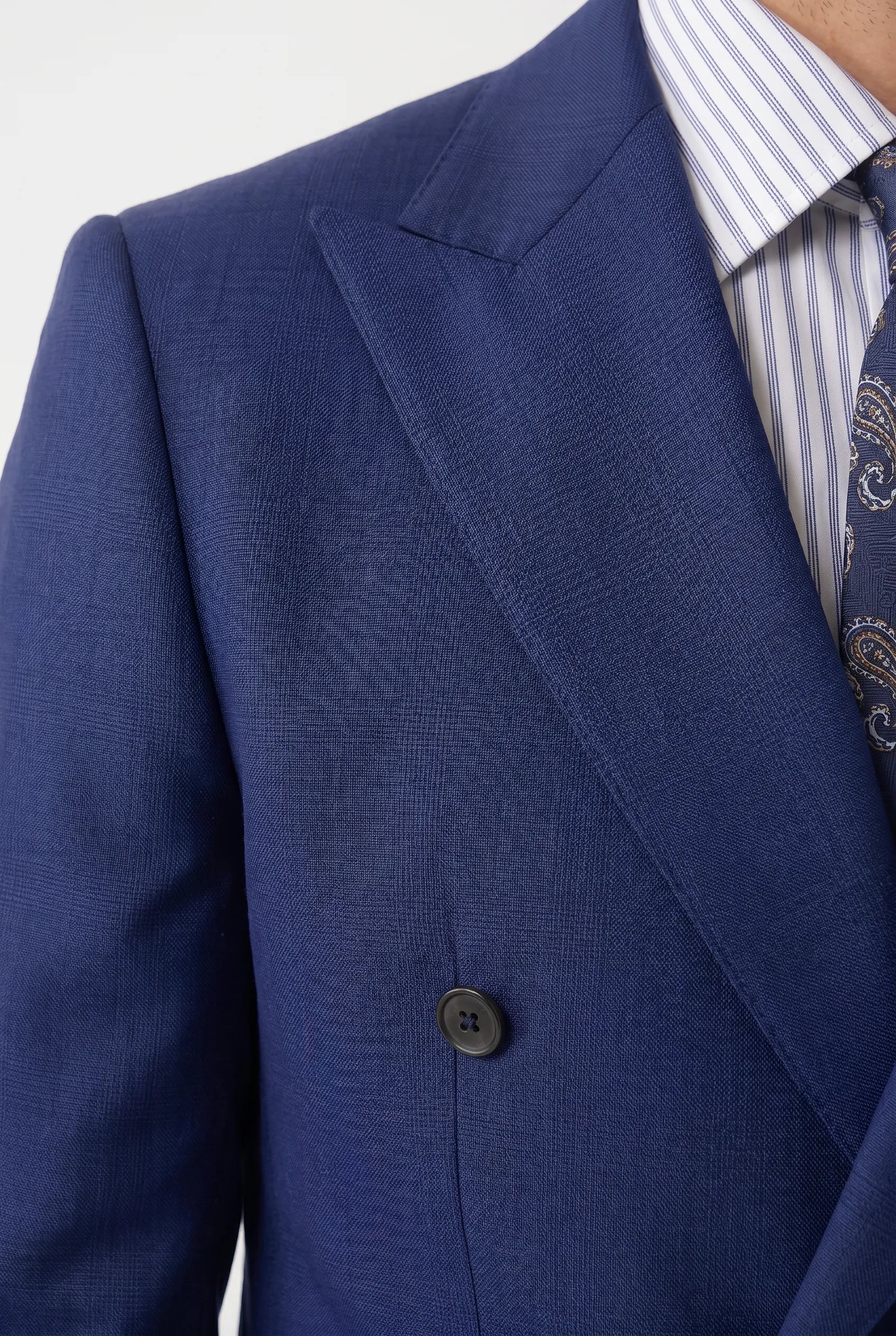 Ink Crownline royal blue Matte Suiting and peak lapel close-up