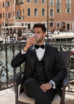Man wearing The Regal Floral Black jacquard tuxedo with oversized shawl collar for prom - Nevo Suits