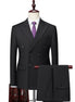 Black suit with a purple tie on a mannequin against a white background