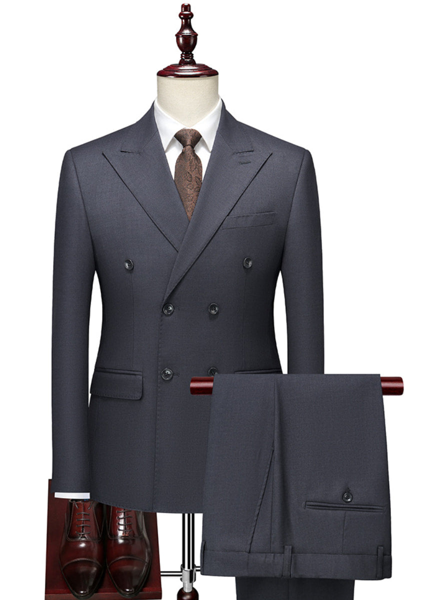 Gray double-breasted suit on a mannequin with a white shirt and brown tie.