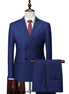 Blue suit on a mannequin with a white shirt and red tie against a white background