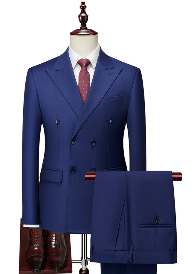 Blue suit on a mannequin with a white shirt and red tie against a white background