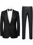 Black patterned tuxedo jacket and pants on a white background