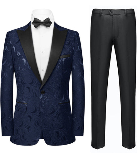 Navy patterned suit jacket with black lapels and matching pants on a white background