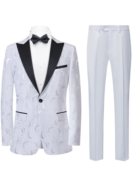 White tuxedo with black lapels and bow tie on a white background