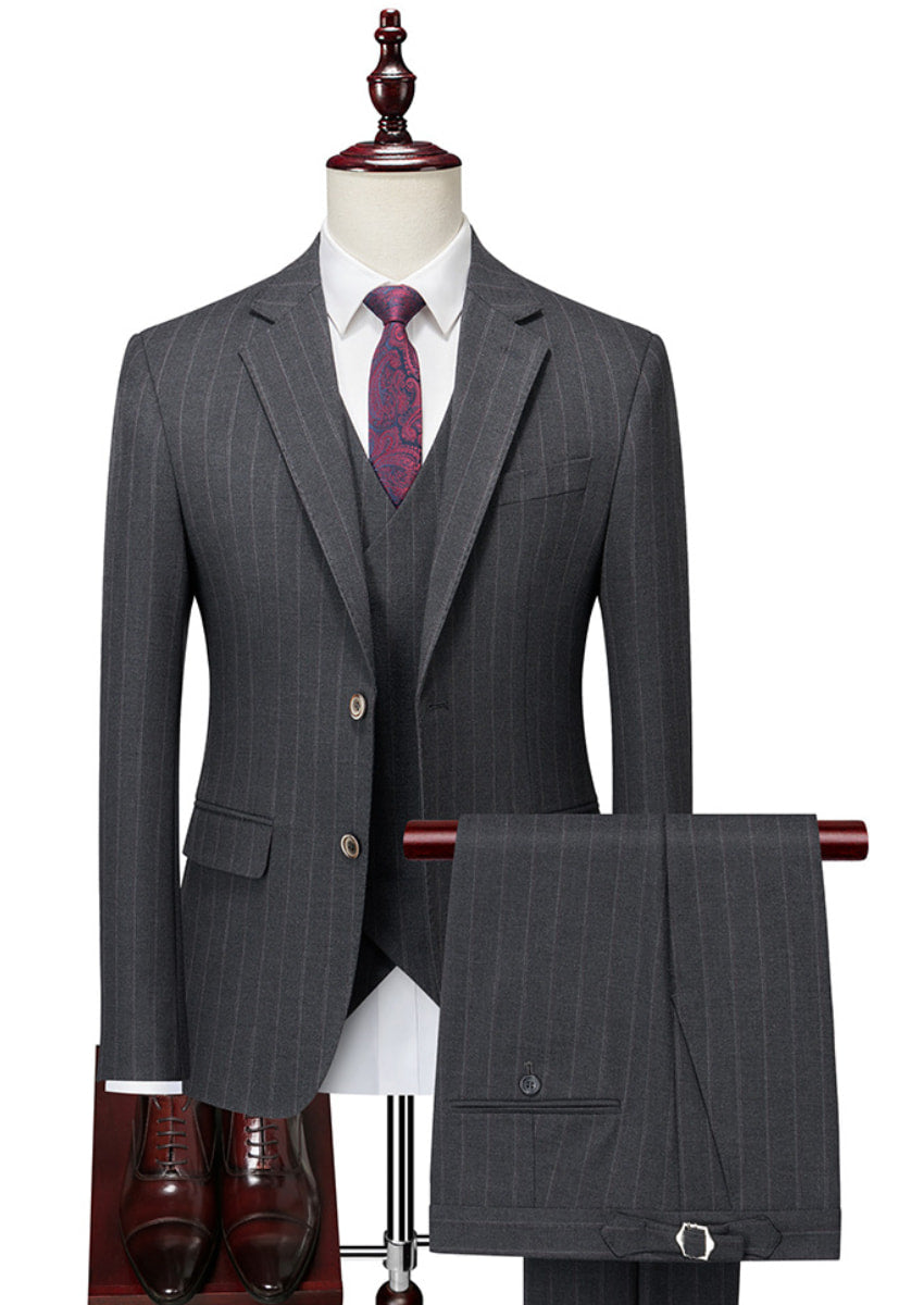 Gray pinstripe suit with a purple tie on a mannequin against a white background