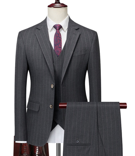 Gray pinstripe suit with a purple tie on a mannequin against a white background