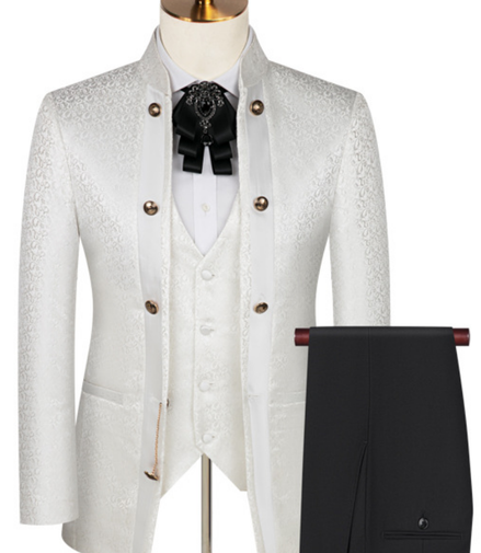 White suit jacket, vest, and pants on a mannequin with a white background