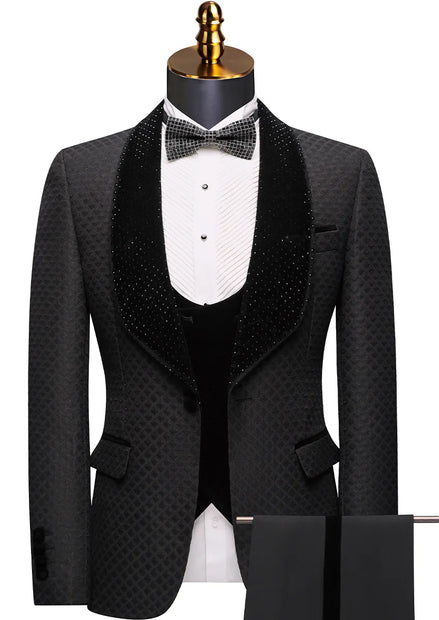 Black tuxedo with a bow tie on a mannequin against a white background