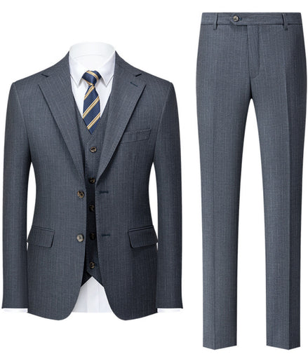 Gray suit with vest and pants on a white background