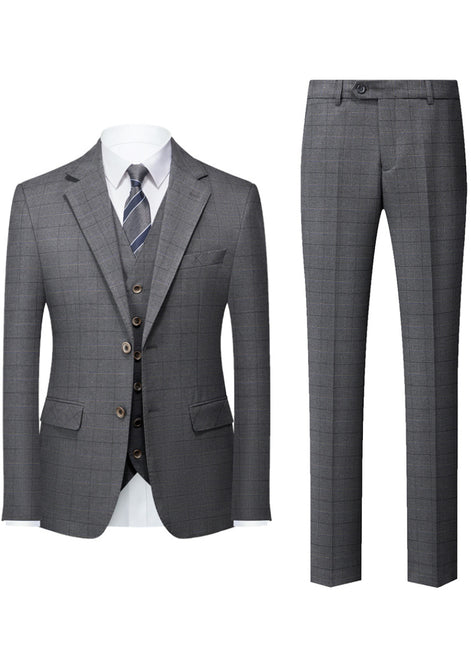 Gray checkered suit with jacket, vest, and pants on a white background