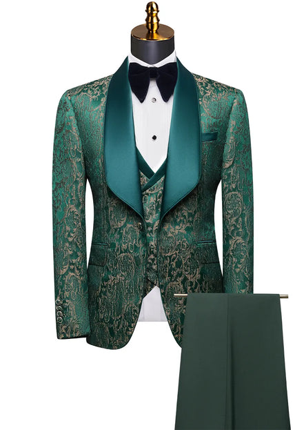 Green patterned tuxedo with matching vest and pants on a mannequin against a white background.