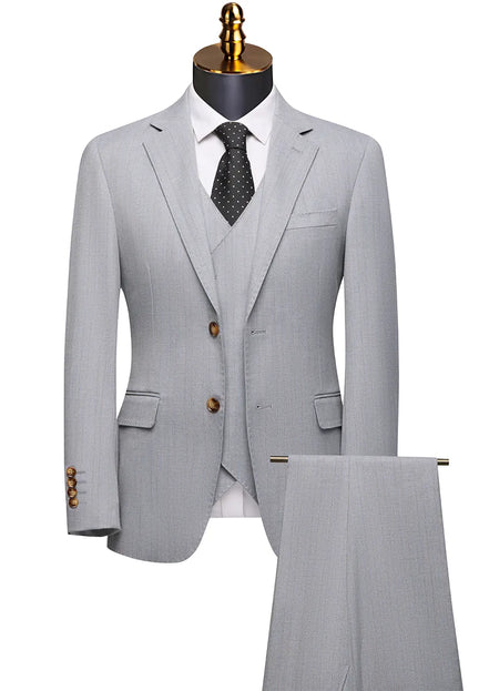 Gray suit with a tie on a mannequin against a white background