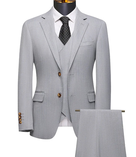 Gray suit with a tie on a mannequin against a white background
