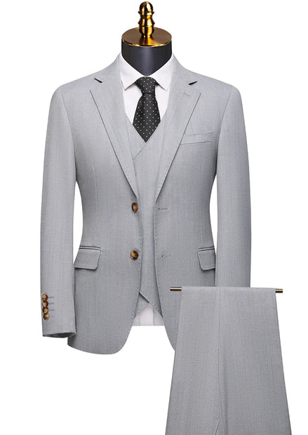 Gray suit with a tie on a mannequin against a white background