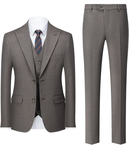 Gray suit with jacket, vest, and pants on a white background