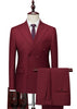 Maroon suit on a mannequin with a white shirt and patterned tie, on a white background.