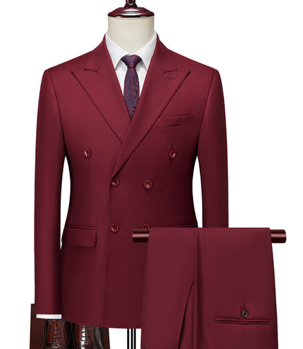 Maroon suit on a mannequin with a white shirt and patterned tie, on a white background.