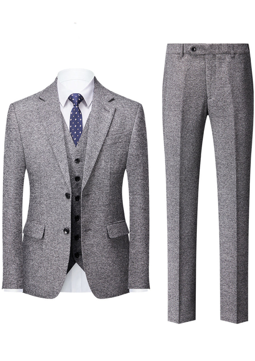 Gray suit with jacket, vest, and pants on a white background
