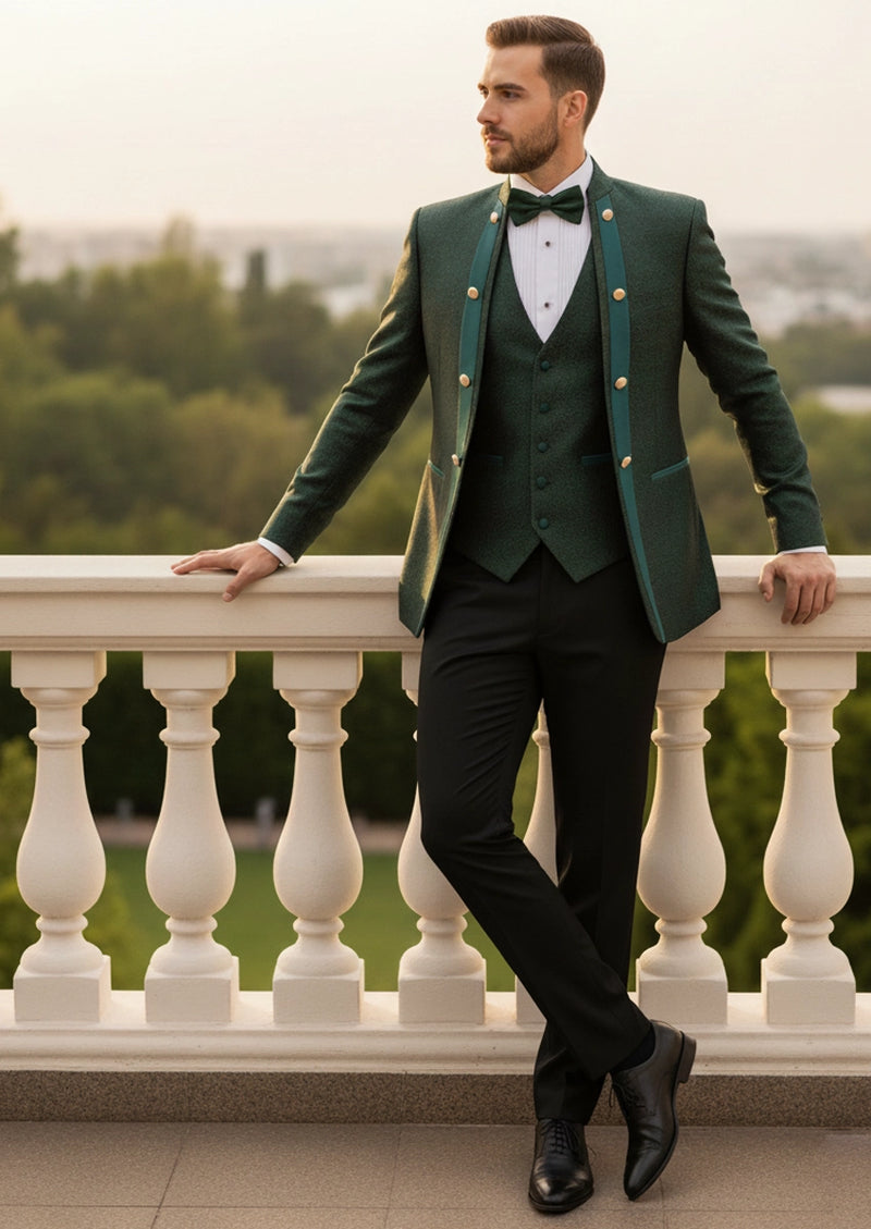 Model wearing Jade Overlord emerald green paisley 3-piece tuxedo in a garden setting - Nevo Suits