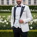 Full front view of Ivory Nebula white and gold geometric jacquard tuxedo with black peak lapel and vest - Nevo Suits