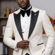 Full front view of Ivory Nebula white and gold geometric jacquard tuxedo with black peak lapel and vest - Nevo Suits