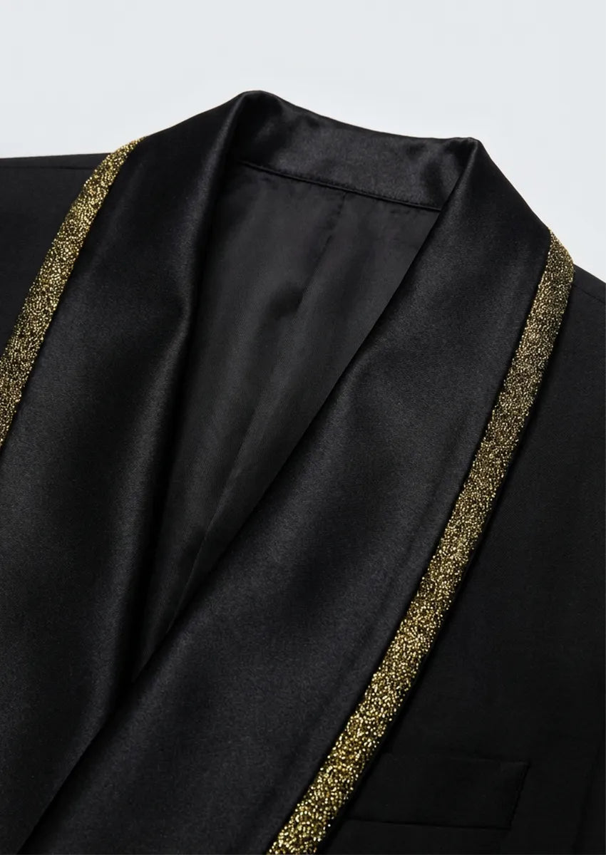 Matching black vest with gold trim detailing for 3-piece wedding suit