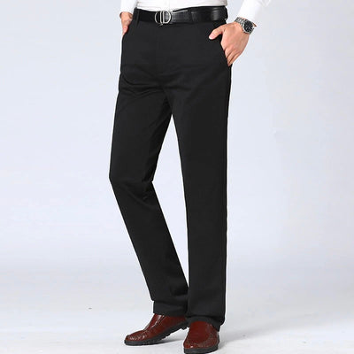 Side profile of model in Ivory Meridian white paisley 3-piece tuxedo with slim fit trousers - Nevo Suits