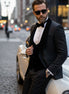Man wearing The Onyx Royale black 3D diamond jacquard tuxedo with velvet lapel for prom - Nevo Suits
