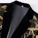 Black velvet peak lapel detail on gold embroidered tuxedo